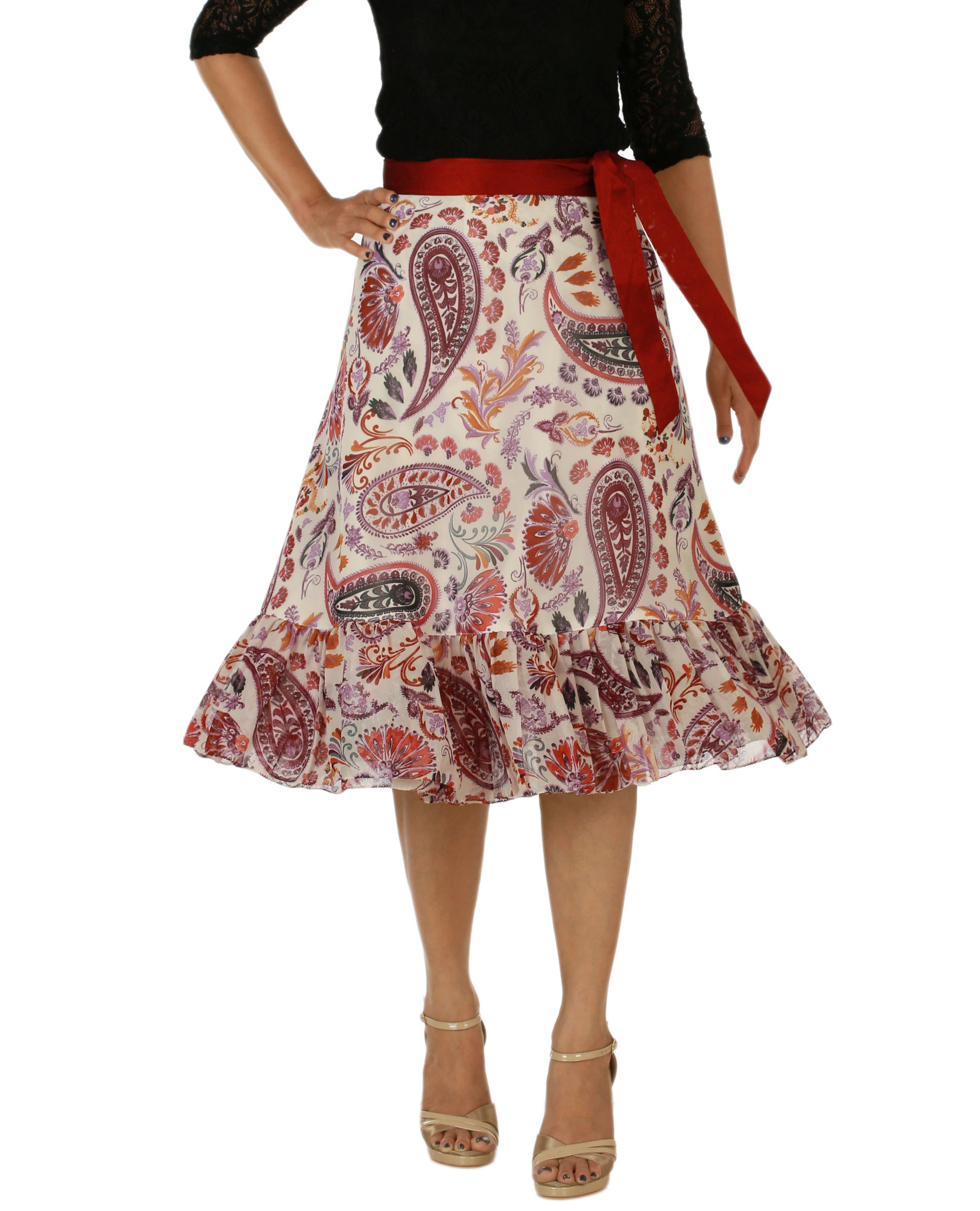 Woman wearing a multicolor patterned free size wrap skirt with a maroon silk belt on a white background WA000158
